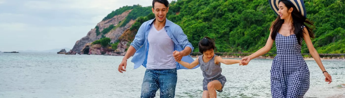 TourCare Plus page header family on beach